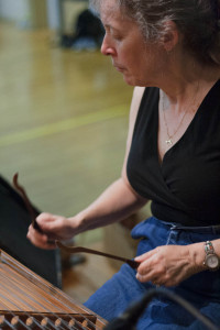 Lucille Reilly of Aurora, Colo., plays dulcimer for the dance.